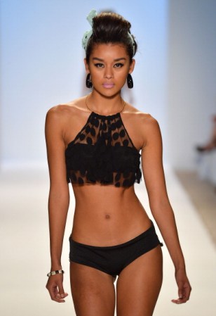 MIAMI, FL - JULY 20: A model walks the runway at the Nicolita show during Mercedes-Benz Fashion Week Swim 2014 at Oasis at the Raleigh on July 20, 2013 in Miami, Florida. (Photo by Frazer Harrison/Getty Images for Mercedes-Benz Fashion Week Swim 2014)