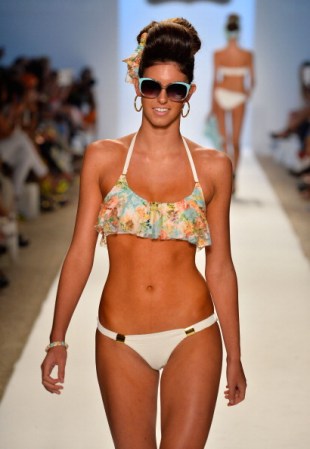 MIAMI, FL - JULY 20: A model walks the runway at the Nicolita show during Mercedes-Benz Fashion Week Swim 2014 at Oasis at the Raleigh on July 20, 2013 in Miami, Florida. (Photo by Frazer Harrison/Getty Images for Mercedes-Benz Fashion Week Swim 2014)
