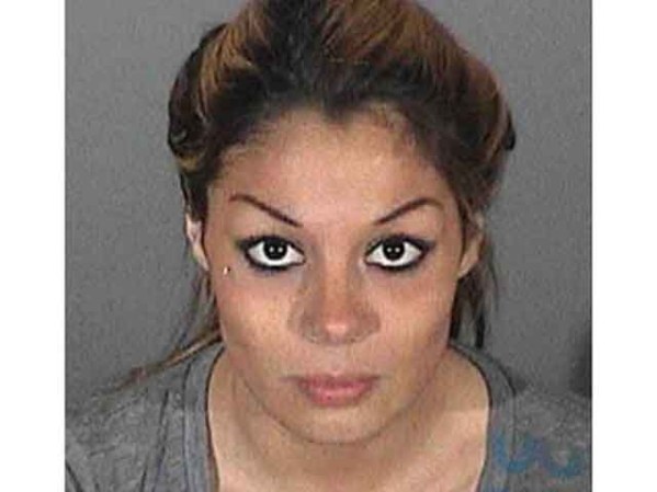 La presunta amante de Tiger Woods Jamie Grubbs fue arrestada en Los Angeles en abril del 2010 por orden de un juez, ya que tenía pendientes tres casos de conducir sin licencia.