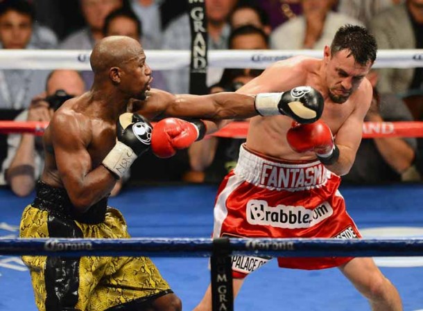 El pugilista Floyd Mayweather retuvo el título del peso welter del Consejo Mundial de Boxeo (CMB) al vencer por decisión unánime a Robert Guerrero.