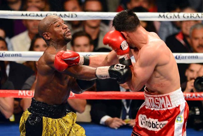 El pugilista Floyd Mayweather retuvo el título del peso welter del Consejo Mundial de Boxeo (CMB) al vencer por decisión unánime a Robert Guerrero.