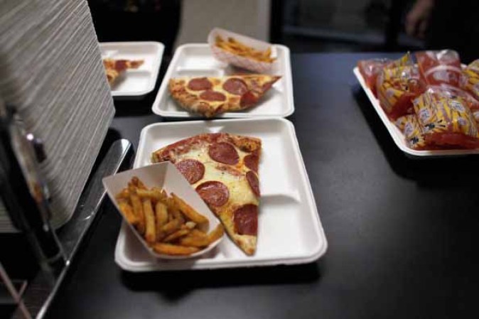 Pizzas congeladas - Contienen Grasas Trans para conservarlas.