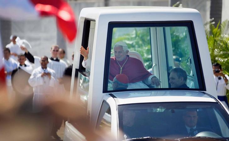HAVANA, CUBA - MARCH 28: Pope Benedict XVI waves from the Popemobile after his mass at Havana's Revolution Square on the last day of his three day visit on March 28, 2012 in Havana, Cuba. Fourteen years after Pope John Paul II visited Cuba, Pope Benedict is making his first trip to the communist country. (Photo by Joe Raedle/Getty Images)