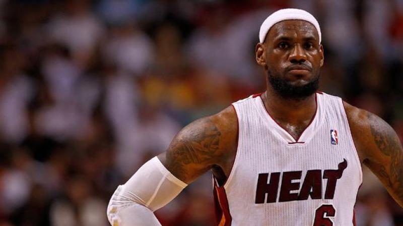 MIAMI, FL - APRIL 22: LeBron James #6 of the Miami Heat looks on during a game against the Houston Rockets at American Airlines Arena on April 22, 2012 in Miami, Florida. NOTE TO USER: User expressly acknowledges and agrees that, by downloading and/or using this Photograph, User is consenting to the terms and conditions of the Getty Images License Agreement. (Photo by Mike Ehrmann/Getty Images)
