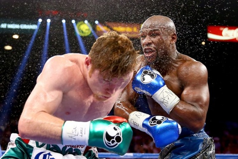 Floyd Mayweather y Saúl Álvarez.