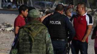 mexico-ciudad-juarez-migrantes-policias