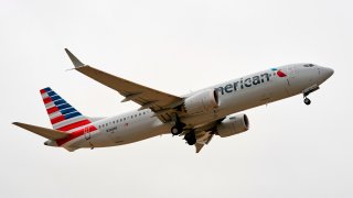 An American Airlines Boeing 737 MAX airplane takes off on a test flight from Dallas-Fort Worth International Airport in Dallas, Texas, on December 2, 2020. - The Boeing 737 MAX is taking another key step in its comeback to commercial travel by attempting to reassure the public with a test flight by American Airlines conducted for the news media.