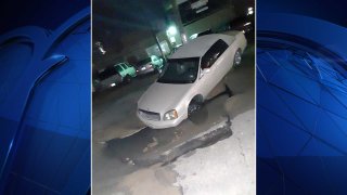 NBC 5 viewer Glen Clark emailed iSee@nbcdfw.com a picture of a car nearly swallowed by a sinkhole in Fort Worth.