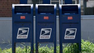 FILE - Mailboxes are seen in Annapolis, Md., Aug. 18, 2020.
