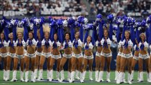 The Dallas Cowboys Cheerleaders perform during the game against the New York Giants at AT&T Stadium on October 10, 2021 in Arlington, Texas.