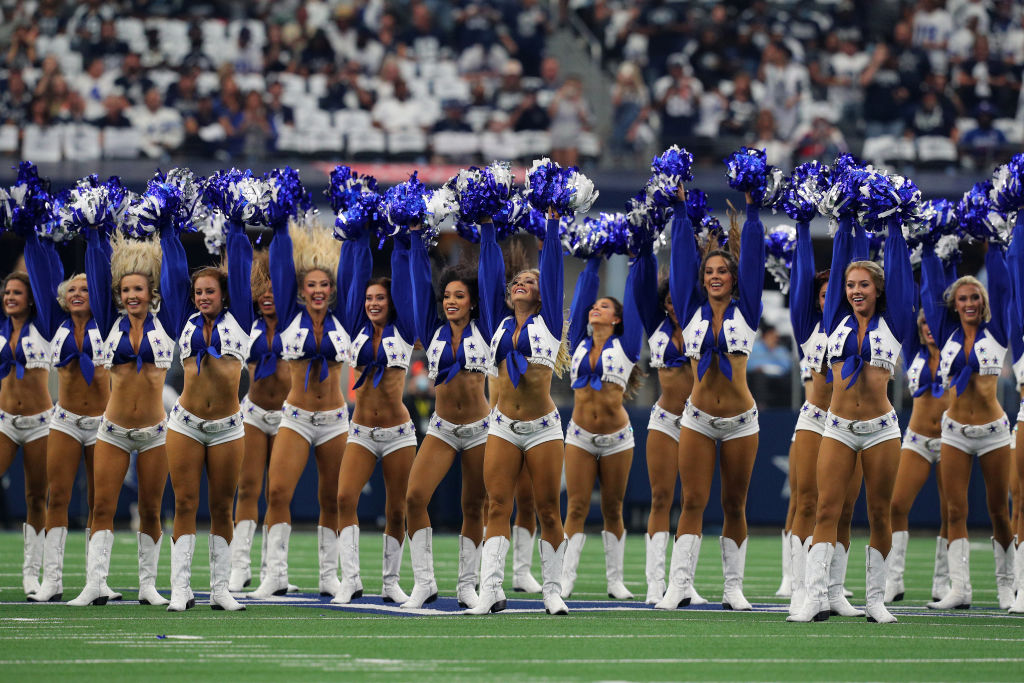 The Dallas Cowboys Cheerleaders perform during the game against the New York Giants at AT&T Stadium on October 10, 2021 in Arlington, Texas.