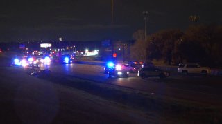 Two people were killed in a crash that shut down Interstate 30 in Dallas Monday morning, deputies say.