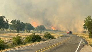 A wildfire in Palo Pinto County has consumed thousands of acres and prompted evacuations, authorities say.