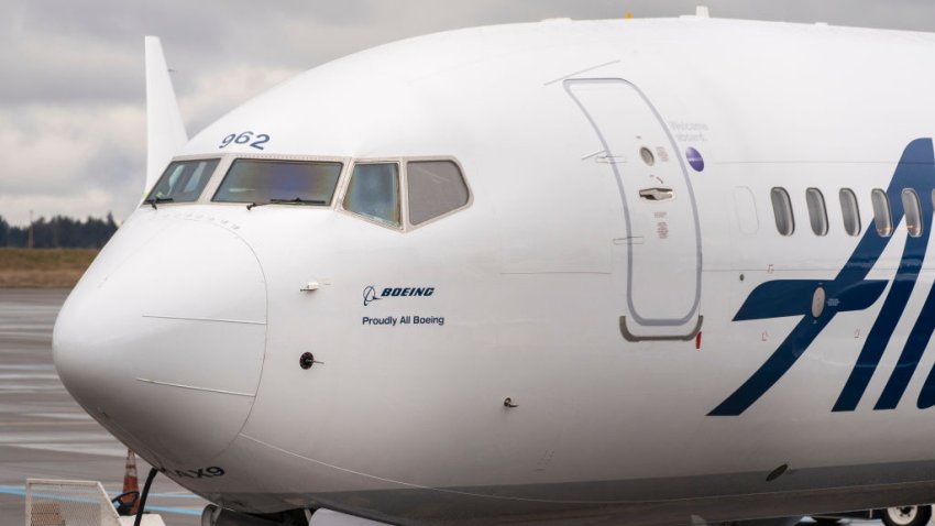 An Alaska Airlines Boeing 737 Max-9 aircraft grounded at Seattle-Tacoma International Airport (SEA) in Seattle, Washington, US, on Saturday, Jan. 6, 2024. Alaska Airlines will ground its entire fleet of Boeing Co. 737 Max-9 aircraft after a fuselage section in the rear part of the brand-new jet blew out shortly after takeoff. Photographer: David Ryder/Bloomberg via Getty Images