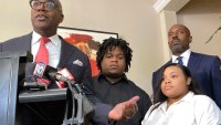 Attorney Roderick Edmond, from left, joined by Treveon Isaiah Taylor, Sr., Jessica Ross and attorney Cory Lynch, speaks during a news conference, Wednesday, Aug. 9, 2023, in Atlanta, announcing a lawsuit against a doctor and Southern Regional Medical Center, a hospital south of Atlanta where Ross went on July 9 to have her son. A doctor used too much force and decapitated Ross’s baby during delivery according to the lawsuit filed Wednesday, the attorneys said.