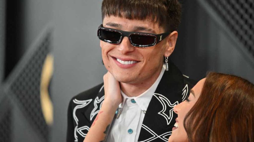 Mexican singer Peso Pluma and Nicki Nicole arrive for the 66th Annual Grammy Awards at the Crypto.com Arena in Los Angeles on February 4, 2024. (Photo by Robyn BECK / AFP) (Photo by ROBYN BECK/AFP via Getty Images)