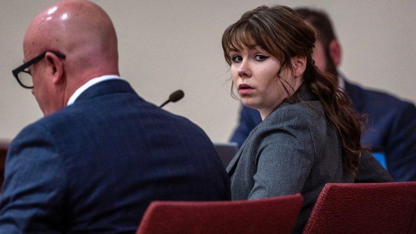 Armorer Hannah Gutierrez-Reed (R) sits in court with her attorney Jason Bowles (L) during the first day of her trial at First District Court, in Santa Fe, New Mexico, on February 22, 2024. Gutierrez-Reed has denied involuntary manslaughter charges in the death of Halyna Hutchins, who died from her injuries after being hit by a live round fired from a gun held by US actor Alec Baldwin during a rehearsal on the set of the movie “Rust”. (Photo by Eddie MOORE / POOL / AFP) (Photo by EDDIE MOORE/POOL/AFP via Getty Images)