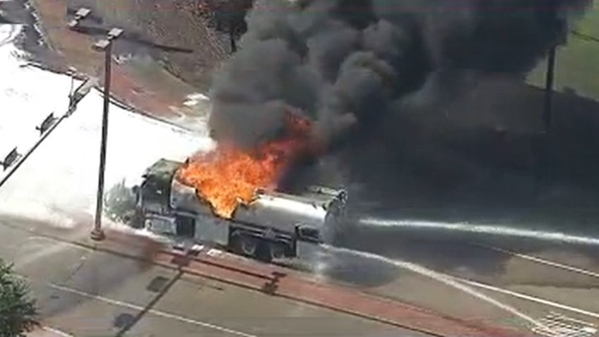 A tanker truck carrying 5,000 gallons of diesel fuel catches fire in DeSoto, Friday, June 7, 2024.