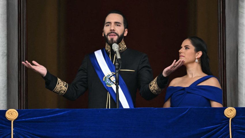 El Salvador’s President Nayib Bukele (L) addresses the attendees next to his wife Gabriela Rodriguez after being sworn in at the National Palace in downtown San Salvador on June 1, 2024. Bukele is sworn in for a second term, more popular — and more powerful — than ever. The 42-year-old, reelected in February with 85 percent of the vote, is set to govern for another five years with near-total control of parliament and other state institutions. (Photo by Marvin RECINOS / AFP) (Photo by MARVIN RECINOS/AFP via Getty Images)