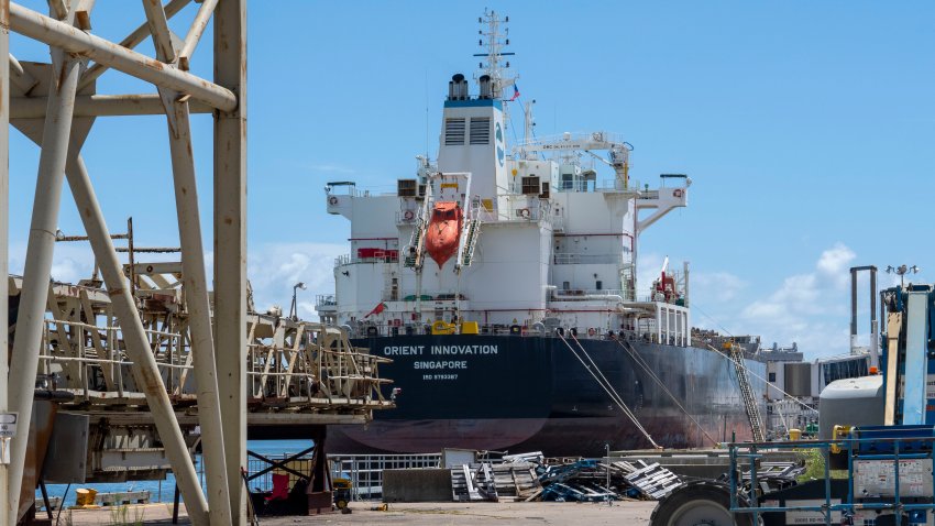 GALVESTON, TEXAS - AUGUST 15: A cargo ship is docked near the historic grain elevator, at the Port of Galveston Thursday, Aug. 15, 2024. (Kirk Sides/Houston Chronicle via Getty Images)