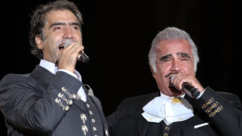 GUADALAJARA, MEXICO – JUNE 27:  Singers Alejandro Fernandez and his father Vicente Fernandez performs a duo during Jalisco en Vivo 2009 at Glorieta de la Minerva on June 27, 2009 in Guadalajara, Mexico.  (Photo by Victor Chavez/WireImage)