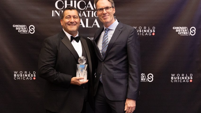 Martin Cabrera with a World Business Chicago award