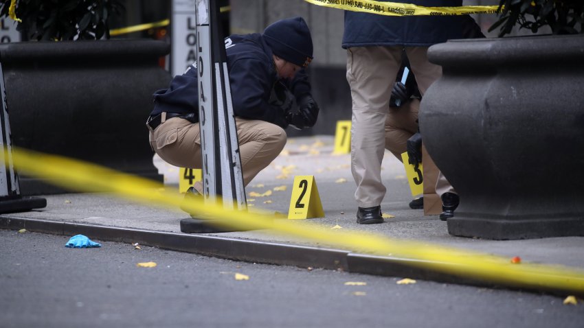 NEW YORK, NEW YORK – DECEMBER 04: Police place bullet casing markers outside of a Hilton Hotel in Midtown Manhattan where United Healthcare CEO Brian Thompson was fatally shot on December 04, 2024 in New York City. Brian Thompson was shot and killed before 7:00 AM this morning outside the Hilton Hotel, just before he was set to attend the company’s annual investors’ meeting. (Photo by Spencer Platt/Getty Images)