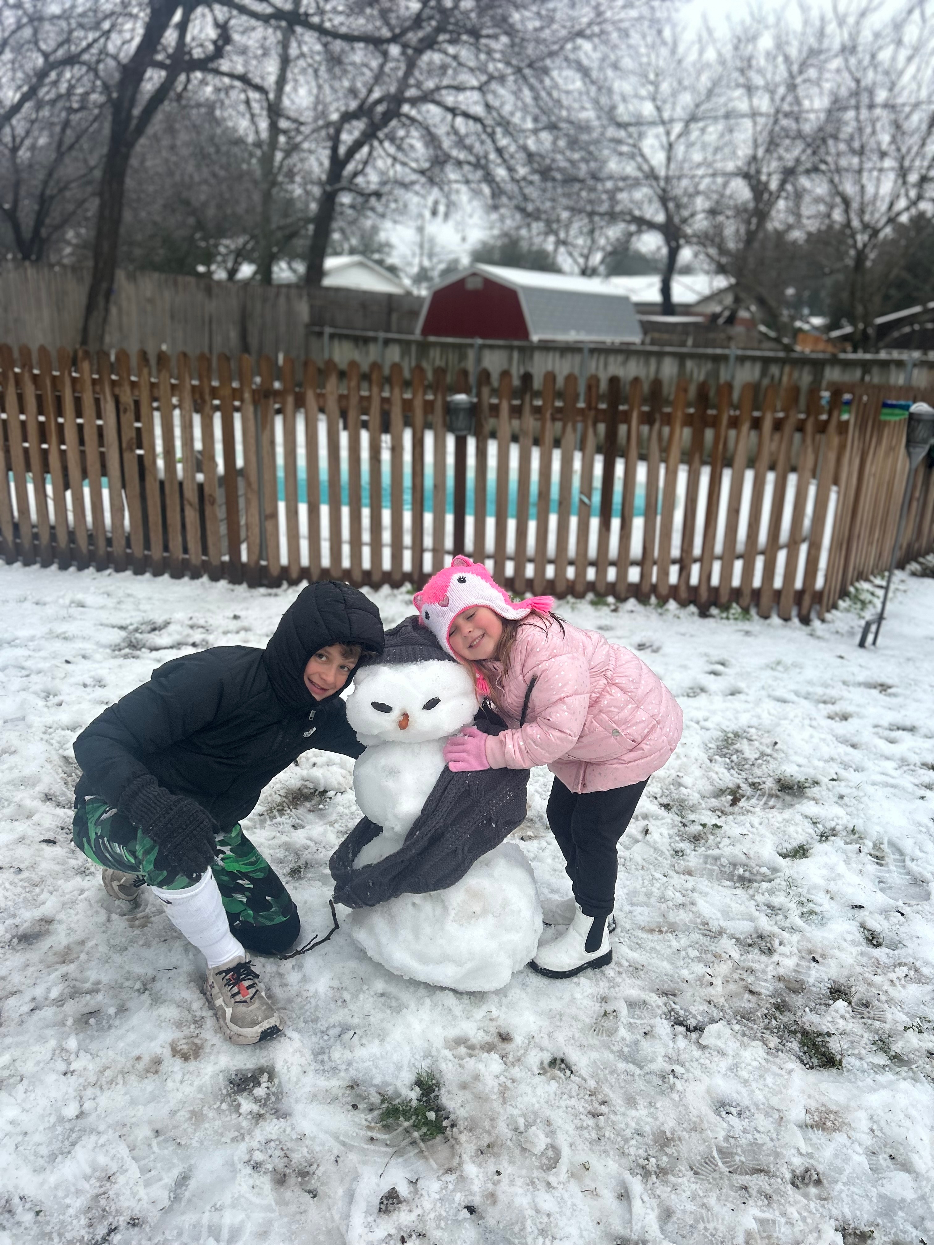 Quinn and Paxtons snowman they built today in Weatherford Texas