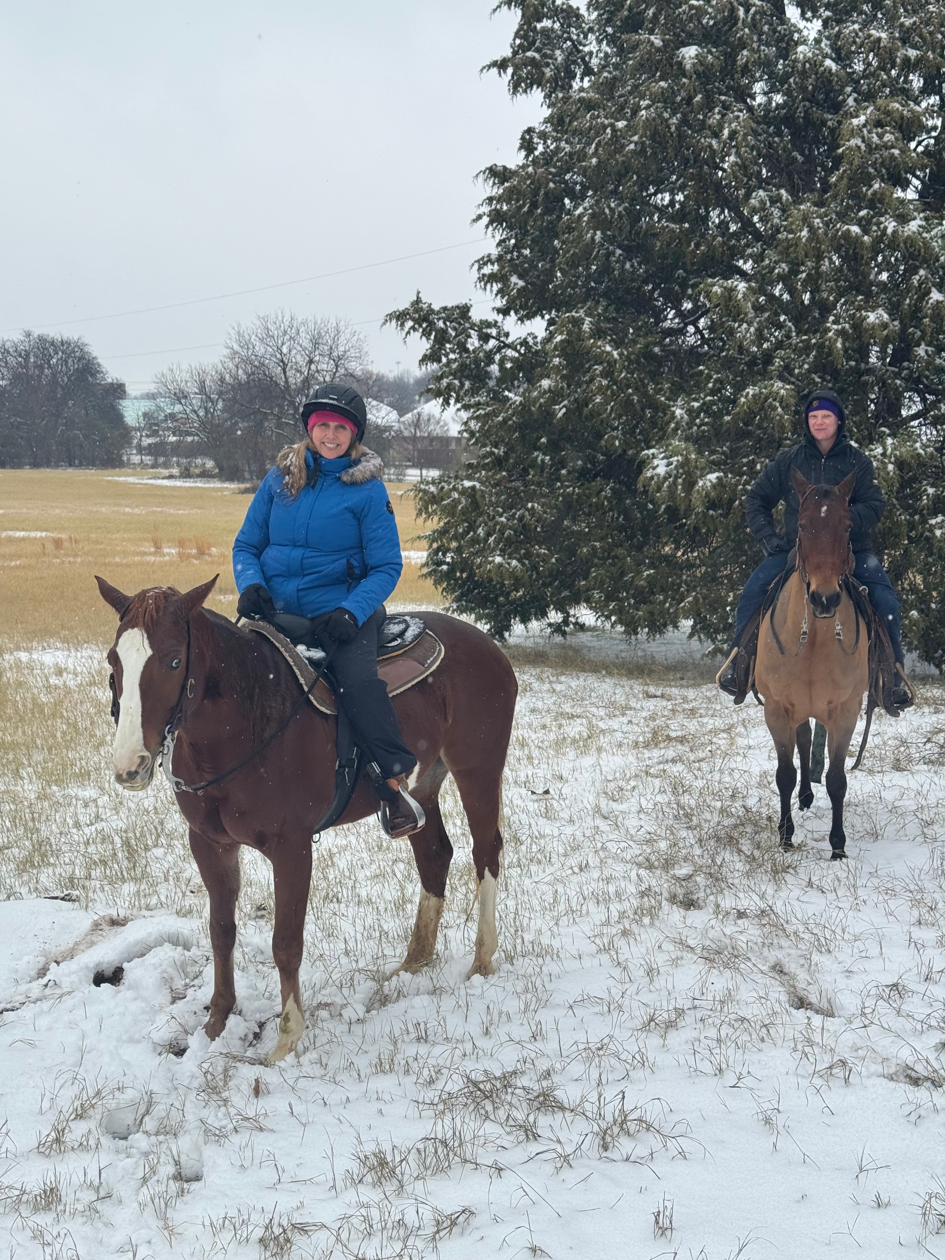 There’s nothing quite like the serenity of horseback riding through a snow-covered landscape. 
Shown: Mia & Molly<br />
Rachel & badger
Olana Equestrian Center in Hickory Creek