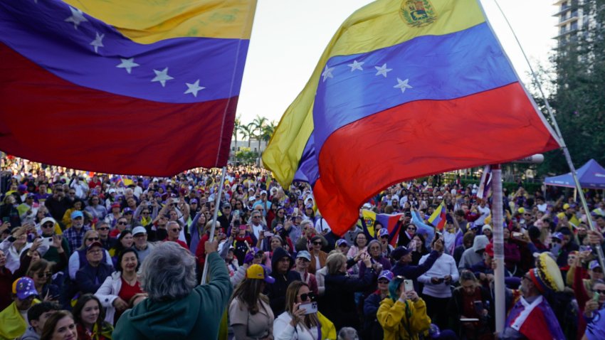 Dozens of Venezuelans rallied in support of opposition leader Maria Corina Machado a day before the Presidential inauguration of January 9, in Miami, Florida.