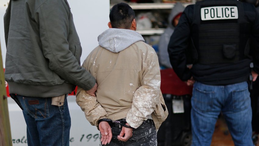 CHARLOTTE, NC – January 8: Immigration and Customs Enforcement agents question and detain undocumented immigrants during traffic stop after an early morning stakeout, Wednesday, January 8, 2020. While agents in the Charlotte Field Office are in charge of thousands of cases at a time, ICE and the Mecklenburg County Sheriff have quarreled over the sheriff’s refusal to follow ICE detainers. (Photo by Eamon Queeney/For The Washington Post via Getty Images)