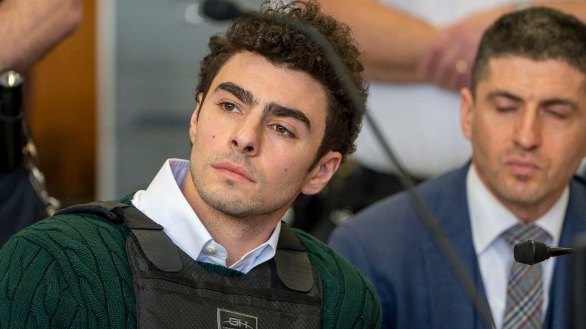 Luigi Mangione, accused killer of US insurance CEO Brian Thompson, sits in Manhattan Supreme Court as he attends a hearing in New York City on Feb. 21, 2025.