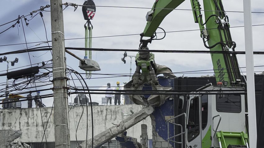 SANTO DOMINGO, DOMINICAN REPUBLIC- APRIL 09: Emergency crews work at the ‘Jet Set’ nightclub after its roof collapsed, in Santo Domingo, Dominican Republic April 9, 2025. The death toll from a roof collapse at a popular nightclub in the Dominican Republic during a concert on Tuesday has risen to 124, following the recovery of additional bodies by rescue teams. (Photo by Gabriel Calderon/Anadolu via Getty Images)
