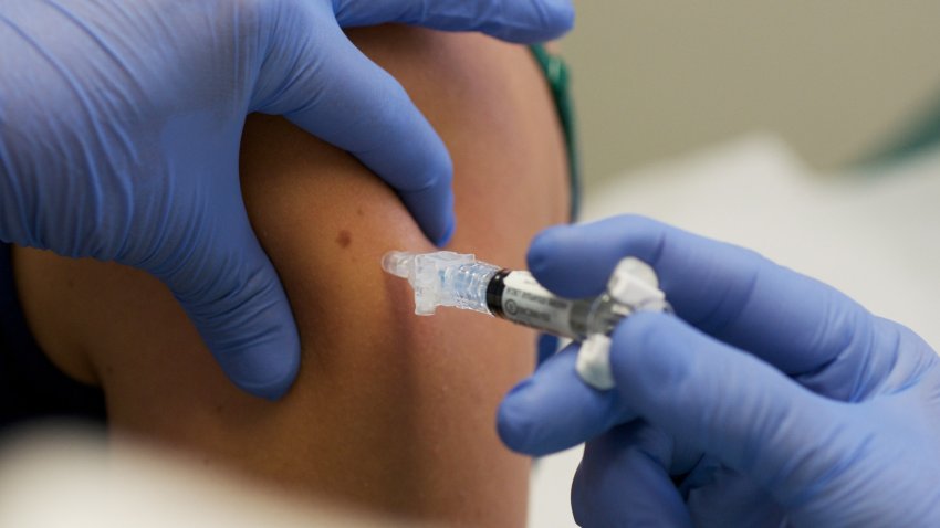 IOWA CITY, IA – AUGUST 11:  Marisa Grunder, 27 of Wilton, Iowa, is given a shot during trials of an H1N1 vaccine, developed by CSL of Australia, at University of Iowa Health Care, the University’s medical center, on August 11, 2009 in Iowa City, Iowa.  The university’s medical center is one of 8 trial sites across the nation conducting human studies on the new vaccine which is looking at optimal dosage levels for a variety of age groups. (Photo by David Greedy/Getty Images)