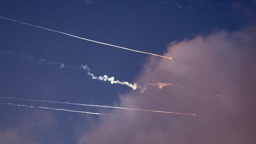 This photo shows rocket trails and intercepts in the sky over the Israeli city of Netanya on June 14, 2025. Iran struck Israel early June 14 with barrages of missiles after a massive onslaught targeted the Islamic republic’s nuclear and military facilities, and killed several top generals. (Photo by JACK GUEZ / AFP) (Photo by JACK GUEZ/AFP via Getty Images)