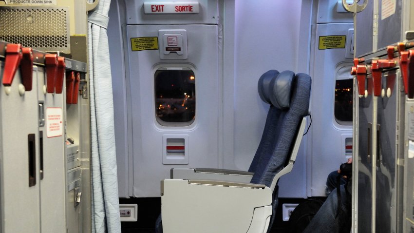Empty economy-class cabin seats by an emergency-exit of an Air Canada Boeing 767-300ER on flight number AC852 YYC-LHR. (Photo by: Aviation-images.com/Universal Images Group via Getty Images)