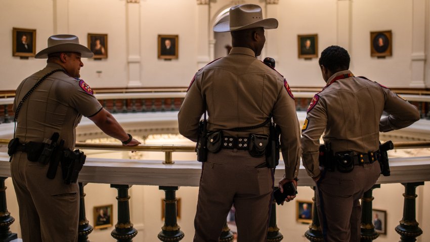 Members of the Texas Department of Public Safety inside the Texas State Capitol in Austin, Texas, US, on Monday, Aug. 4, 2025. Texas Governor Greg Abbott ordered the arrest of Democratic lawmakers who left the state to block a controversial vote on new congressional maps. Photographer: Sergio Flores/Bloomberg via Getty Images